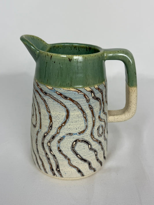 Carved Pitcher
