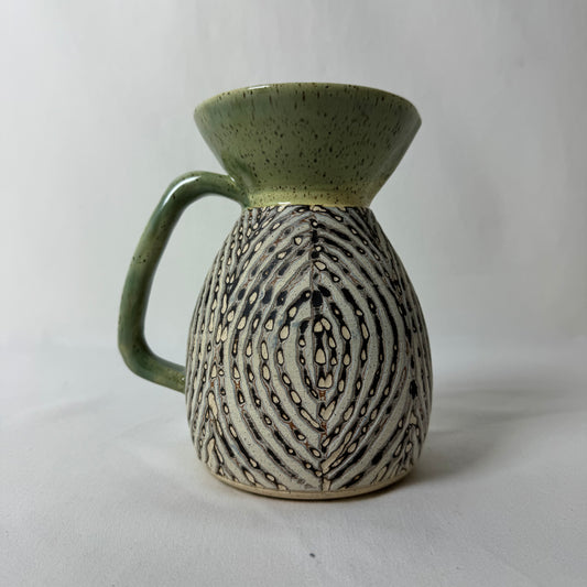 Carved Pitcher